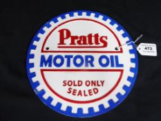 A circular cast iron advertising wall plaque marked Pratts Motor Oil, 24 cm (d.