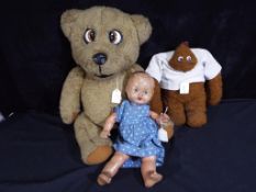 A collection of vintage toys to include a Nooky the Bear soft bodied toy with jointed arms and legs