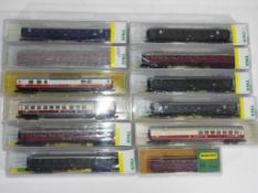 Model Railways - Minitrix - twelve boxed items of N gauge coaches by Minitrix, includes 513017,
