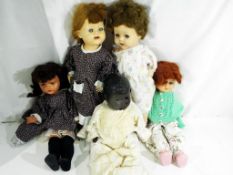 A collection of five mid century dolls to include four walker type dolls approx 50cm (h) and a