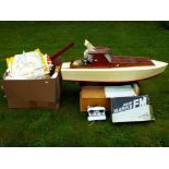 Remote Control Boats - a battery powered wooden yacht on stand,