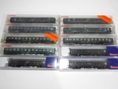 Fleischmann and Roco N gauge - ten passenger carriages, maroon and cream livery,