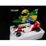Ayrton Senna - a 1:12 scale diecast racing car 540 881212 Mclaren MP4/4 1988,