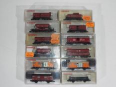 Model Railways - Fleishmann - a collection twelve items of N gauge rolling stock by Fleishmann,