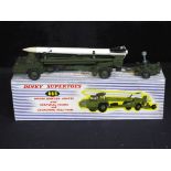 Diecast - a Dinky missile with Corporal missile launching platform in original box,