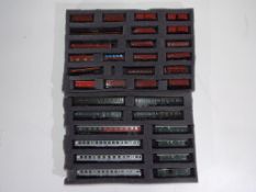 Model Railways - 33 unboxed N gauge coaches and wagons by Fleishmann,