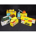 Diecast - Corgi, Dinky - a collection of four boxed diecast vehicles and three empty Dinky boxes,