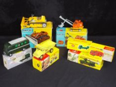 Diecast - Corgi, Dinky - a collection of four boxed diecast vehicles and three empty Dinky boxes,