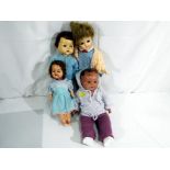 A collection of four mid century dolls to include a girl Roddy Doll approx 30cm (h),