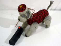 Unboxed battery operated walking, barking and tail wagging Scotty dog,