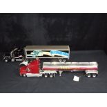 Diecast - Franklin Mint - two unboxed 1:32 scale American Trucks,