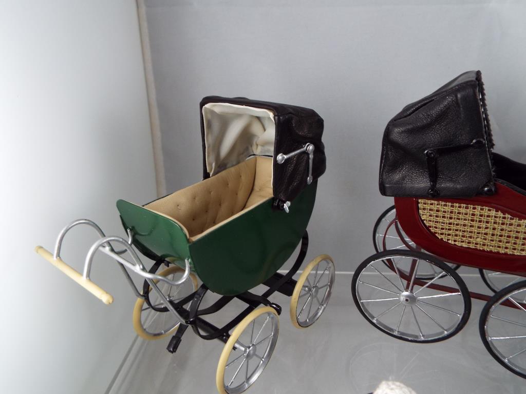 Dolls House miniatures - a collection of eight quality hand made reproduction prams some with - Image 4 of 4