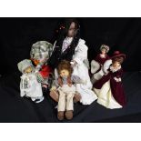 A collection of dolls to include Angela Ferrow by Denise marked 9/99 to the head,