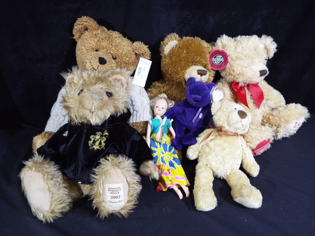 A collection of six bears to include Giorgio Beverly Hills, The Bear Factory,