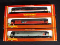 Model Railways - Hornby OO gauge three class 47 diesels which appear to have been repainted or