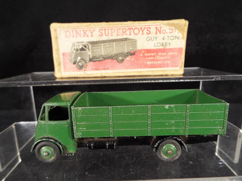 Dinky Supertoys - A boxed Dinky Supertoys #511 Guy 4 - Ton Lorry in green with black chassis, - Image 2 of 2