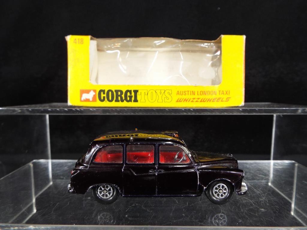 Corgi - A boxed Corgi Whizzwheels #418 Austin London Taxi in black with red interior, - Image 2 of 2