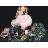 A mixed lot to includes a doll, small collection of diecast vehicles,