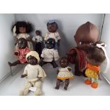 A collection of vintage ethnic dressed dolls to include Tudor Rose, Pedigree,