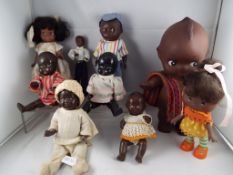 A collection of vintage ethnic dressed dolls to include Tudor Rose, Pedigree,
