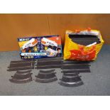 A bag containing a large quantity Scalextric track and accessories,