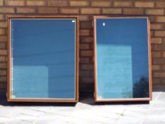 Diecast - two wooden wall mounted display cabinets with glass fronted doors,