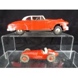 Lot to include a 1950's metal and plastic battery operated car and a Dinky Toys #232 Alfa Romeo