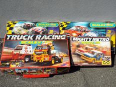 Scalextric - Four boxed Scalextric sets including Scalextric Truck Racing, Mighty Metro,