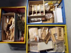 Dolls House Accessories - three large boxes containing doll's house construction materials to