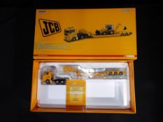 Corgi CC13425 1:50 MAN truck with low loader (missing JCB) appears to be in near mint to mint