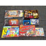 A good mixed lot of toys and board games to include Micro Scalextric, the Euro Saloons Edition,