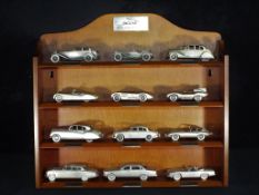 Diecast - Danbury Mint - twelve unboxed pewter model cars from Jaguar The Classic Motorcars