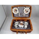 Dolls House Accessories - a Reutter porcelain picnic set featuring The Unique Bear Henry print