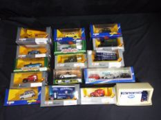 Sixteen diecast vehicles in original boxes by Corgi, includes Morris Minors,
