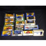 Sixteen diecast vehicles in original boxes by Corgi, includes Morris Minors,