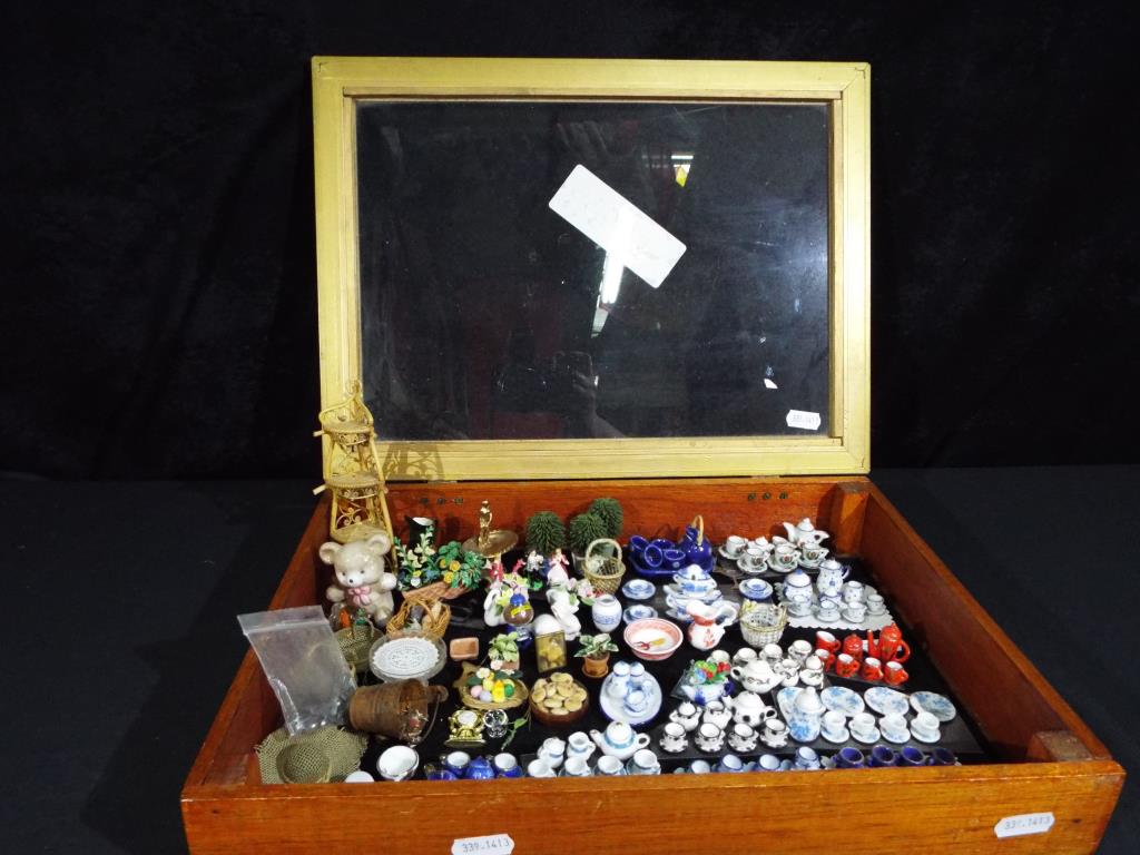 Dolls House accessories - a glass fronted display box,