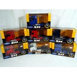 Diecast - seven 1:32 scale diecast trucks by Welly, includes two x MAN TGX in blue and red,