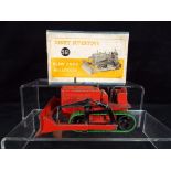 Dinky Supertoys - A boxed Dinky Supertoys #561 Blaw Knox Bulldozer in red with green tracks,