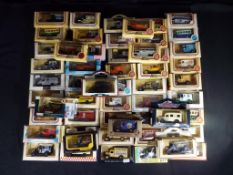 Diecast - in excess of 50 Lledo and Days Gone Vanguards in original window boxes,