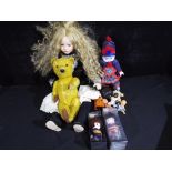 A good mixed lot of dolls to include a ceramic faced doll by Alberon,