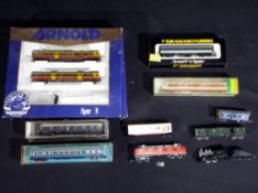 Model Railways - Minitrix, Arnold and others - two locomotives, seven coaches,