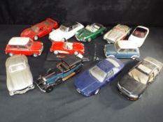 Diecast - Franklin Mint, Solido, Corgi and other - twelve unboxed 1:18 scale diecast models,