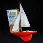Tri-ang - a twenty four inch Tri-ang racing yacht being a scale model of an ocean cabin racer,
