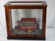 Vintage Bus - a wooden scratch built bus in a wooden and glass cabinet,