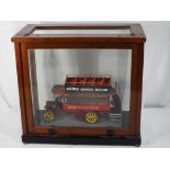 Vintage Bus - a wooden scratch built bus in a wooden and glass cabinet,