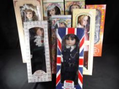 A collection of porcelain faced collector dolls to include The Knightsbridge Collection Agatha,