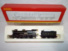 Hornby - an OO gauge model 4-6-0 locomotive and tender, Castle class, GWR livery, op no 4093,