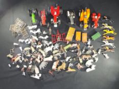 Diecast - Dinnky, Britains and other - eleven unboxed diecast tractors and trailers,