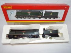 Hornby - an OO scale model 4-6-2 Battle of Britain class locomotive and tender,