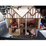A scratch built Tudor style doll's house,